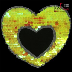 Patch in paillettes arancione a forma di cuore